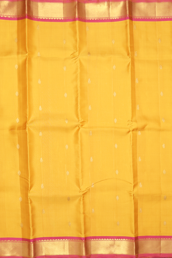 Kanchipuram Silk Saree In Saffron Yellow With Paisley Buttas