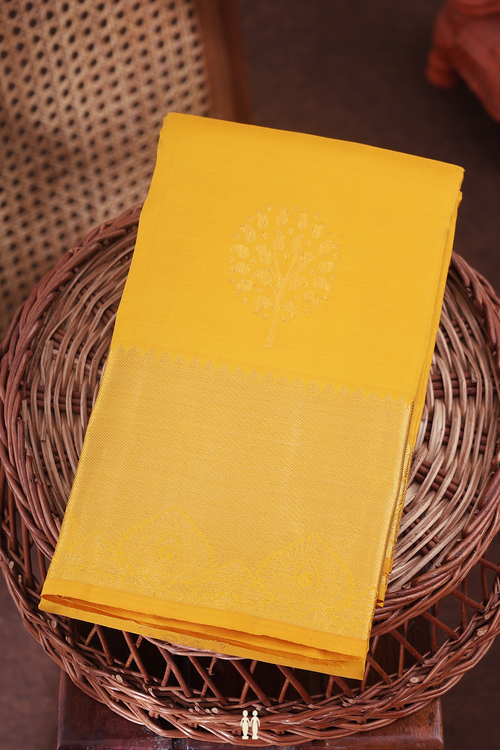 Kanchipuram Silk Saree In Saffron Yellow With Zari Motifs