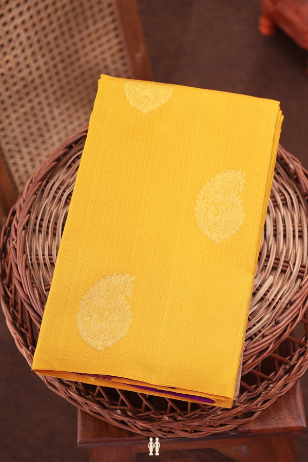 Kanchipuram Silk Saree In Saffron Yellow With Paisley Motifs