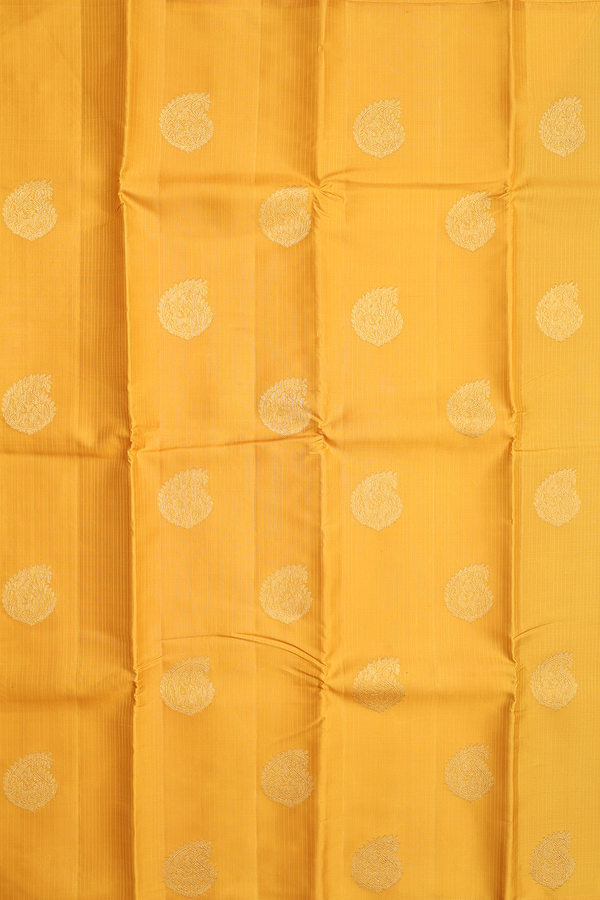 Kanchipuram Silk Saree In Saffron Yellow With Paisley Motifs