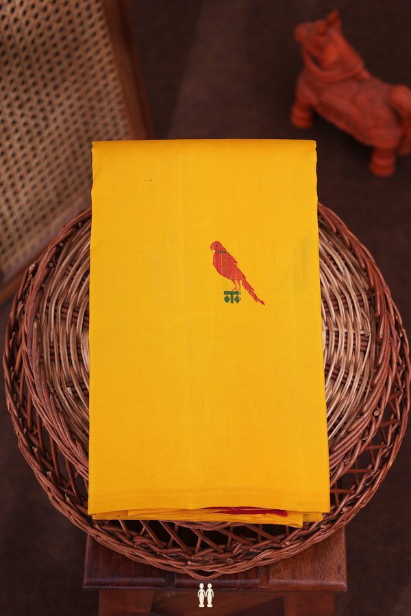 Kanchipuram Silk Saree In Saffron Yellow With Parrot Buttas