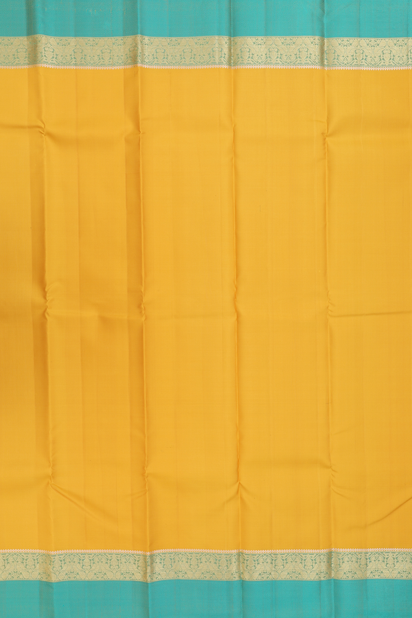 Kanchipuram Silk Saree In Saffron Yellow With Peacock Border