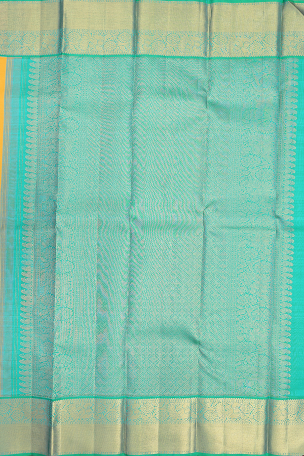 Kanchipuram Silk Saree In Saffron Yellow With Peacock Buttas