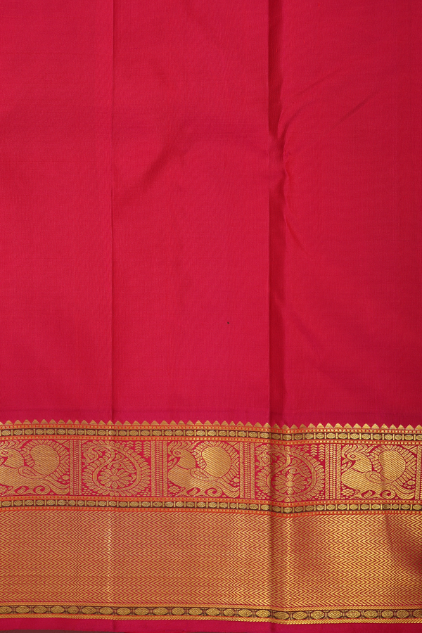 Kanchipuram Silk Saree In Saffron Yellow With Peacock Buttas