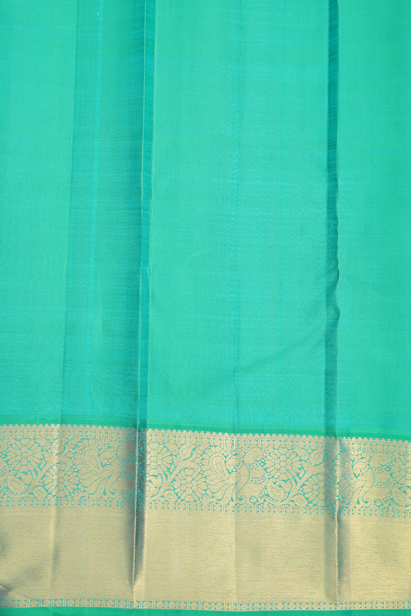 Kanchipuram Silk Saree In Saffron Yellow With Peacock Buttas