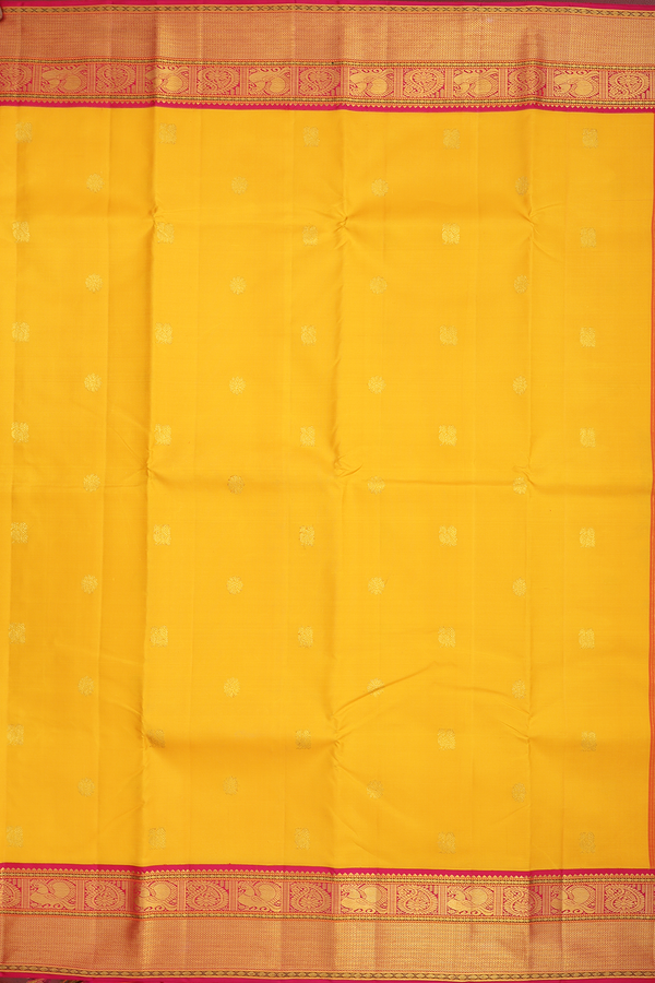Kanchipuram Silk Saree In Saffron Yellow With Peacock Buttas