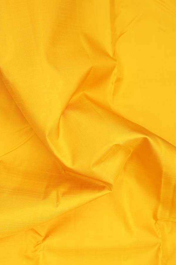 Kanchipuram Silk Saree In Saffron Yellow With Contrast Border