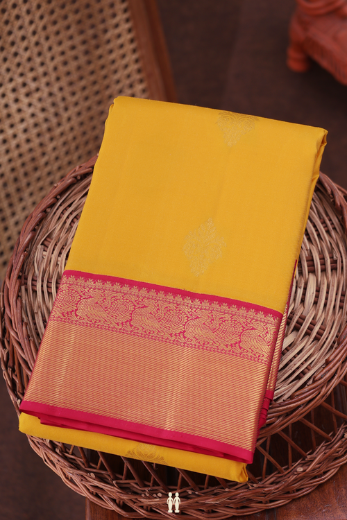 Kanchipuram Silk Saree In Saffron Yellow With Zari Buttas