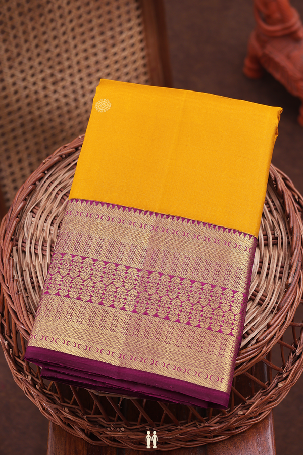 Kanchipuram Silk Saree In Saffron Yellow With Zari Buttas