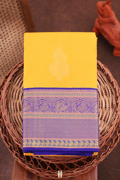 Kanchipuram Silk Saree In Saffron Yellow With Zari Buttas