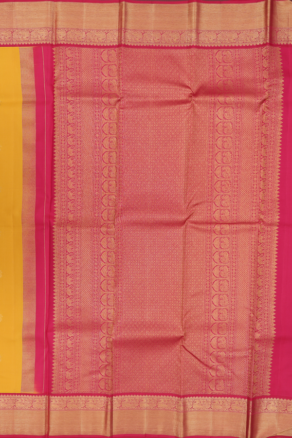 Kanchipuram Silk Saree In Saffron Yellow With Zari Buttas