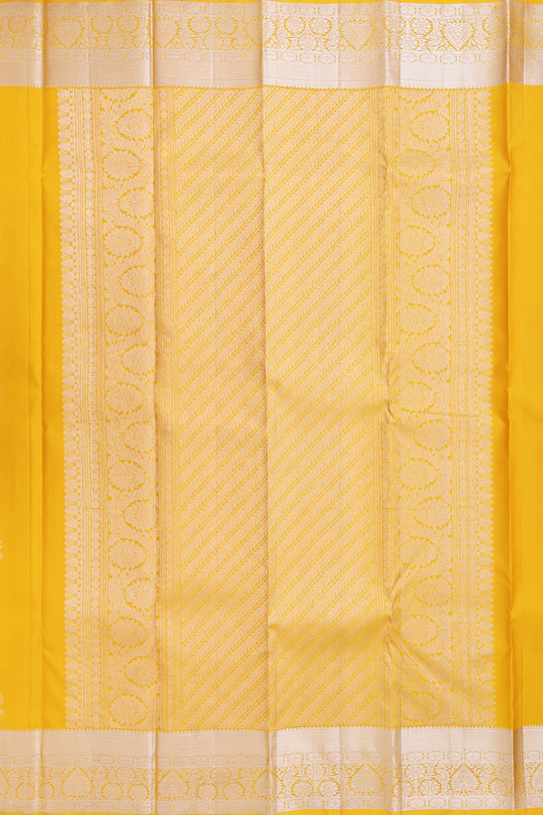 Kanchipuram Silk Saree In Saffron Yellow With Zari Buttas