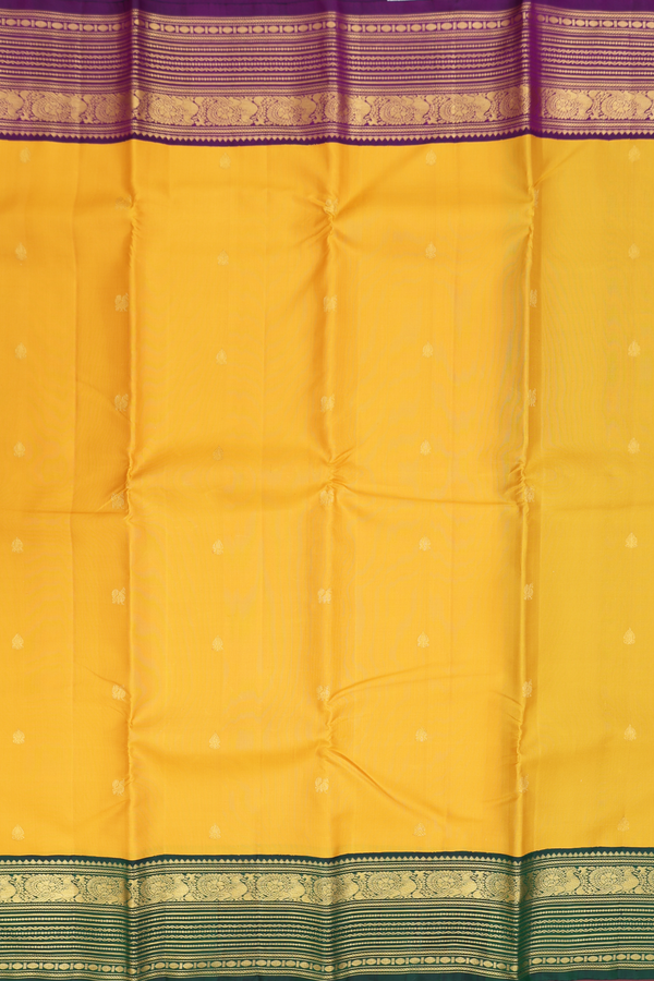 Kanchipuram Silk Saree In Saffron Yellow With Zari Buttas