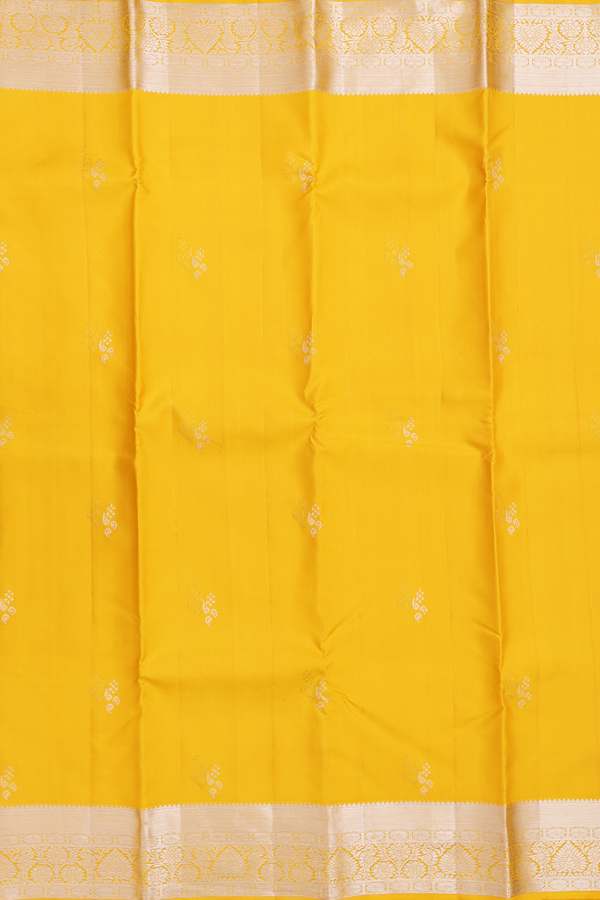 Kanchipuram Silk Saree In Saffron Yellow With Zari Buttas