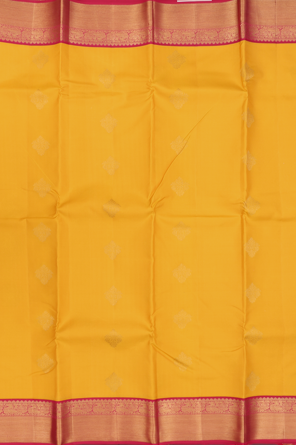 Kanchipuram Silk Saree In Saffron Yellow With Zari Buttas