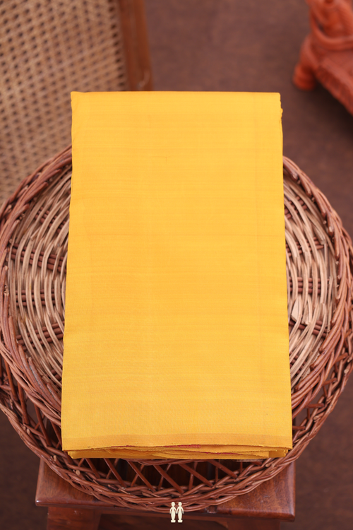 Kanchipuram Silk Saree In Saffron Yellow With Zari Pallu
