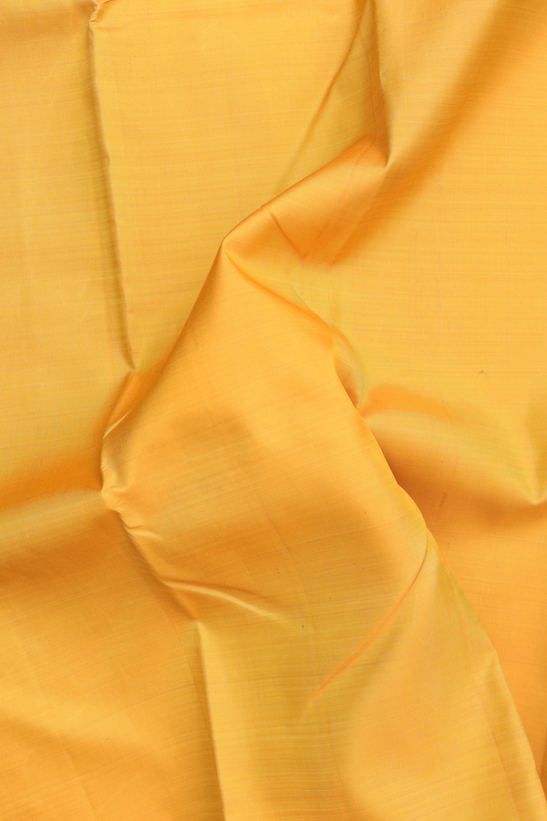 Kanchipuram Silk Saree In Saffron Yellow With Zari Pallu