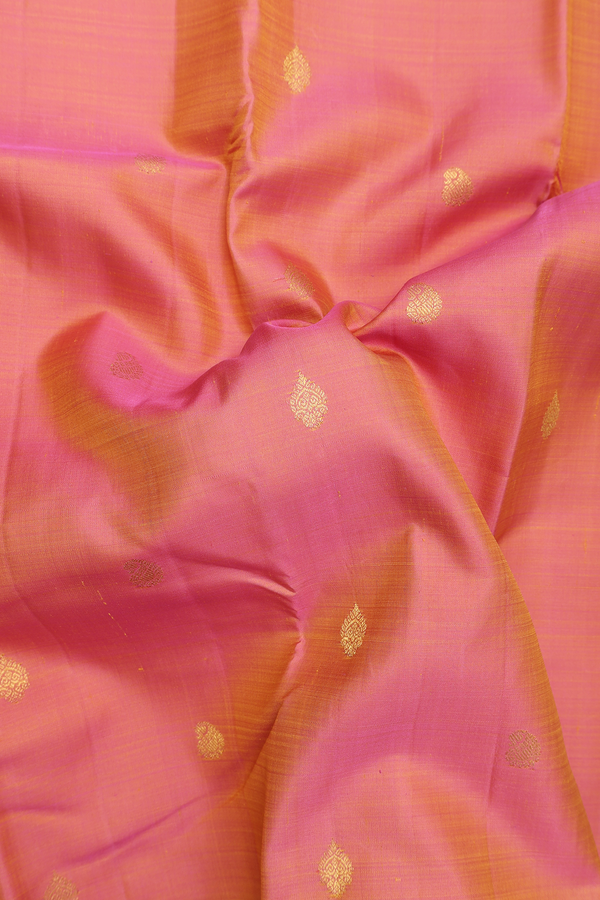 Kanchipuram Silk Saree In Salmon Pink With Zari Buttas