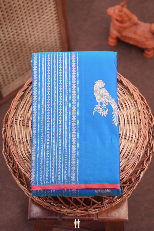 Kanchipuram Silk Saree In Teal Blue Along Stripes With Motifs