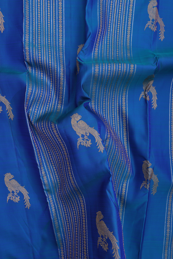 Kanchipuram Silk Saree In Teal Blue Along Stripes With Motifs
