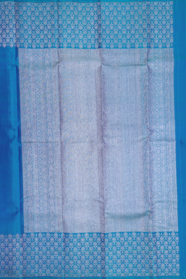 Kanchipuram Silk Saree In Teal Blue With Floral Buttas