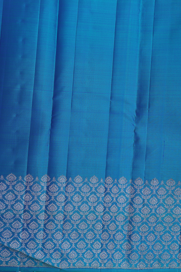 Kanchipuram Silk Saree In Teal Blue With Floral Buttas