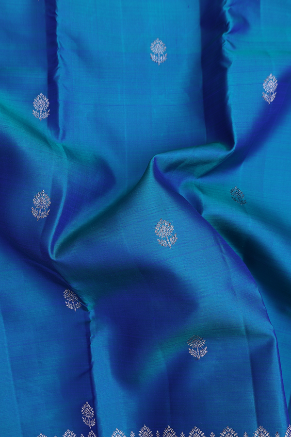 Kanchipuram Silk Saree In Teal Blue With Floral Buttas