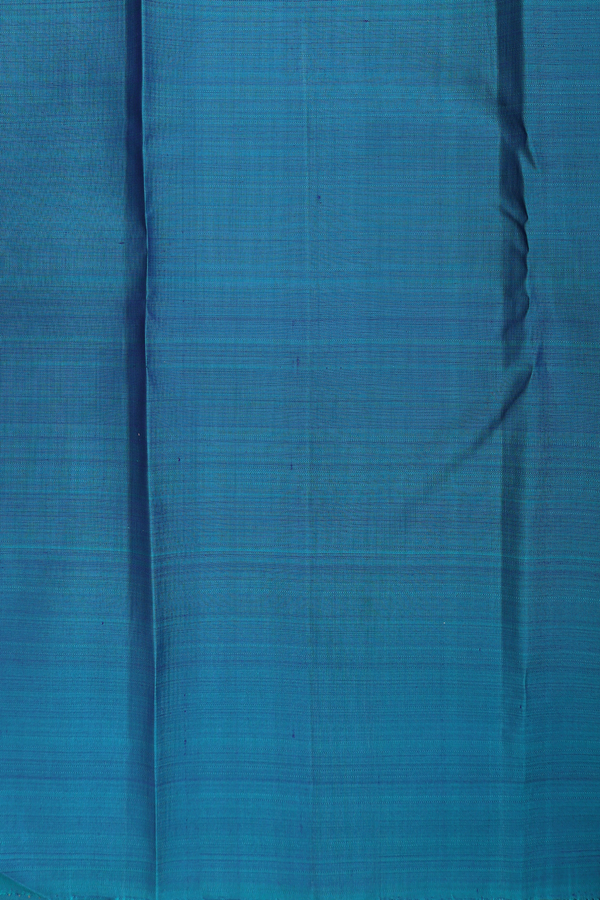 Kanchipuram Silk Saree In Teal Blue With Paisley Buttas