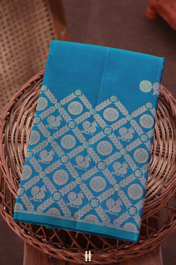 Kanchipuram Silk Saree In Teal Blue With Peacock Buttas