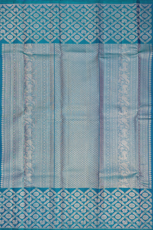 Kanchipuram Silk Saree In Teal Blue With Peacock Buttas