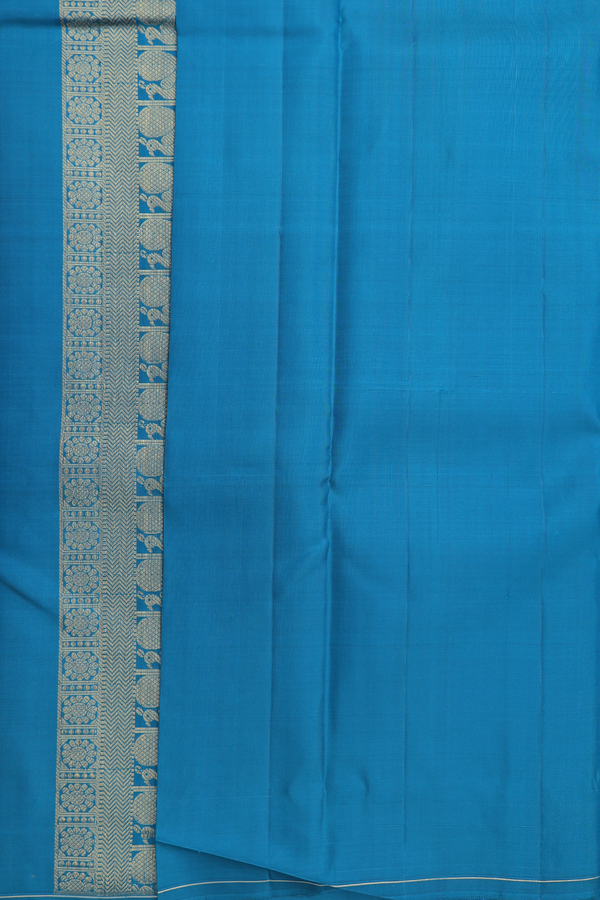 Kanchipuram Silk Saree In Blue With Peacock Buttas