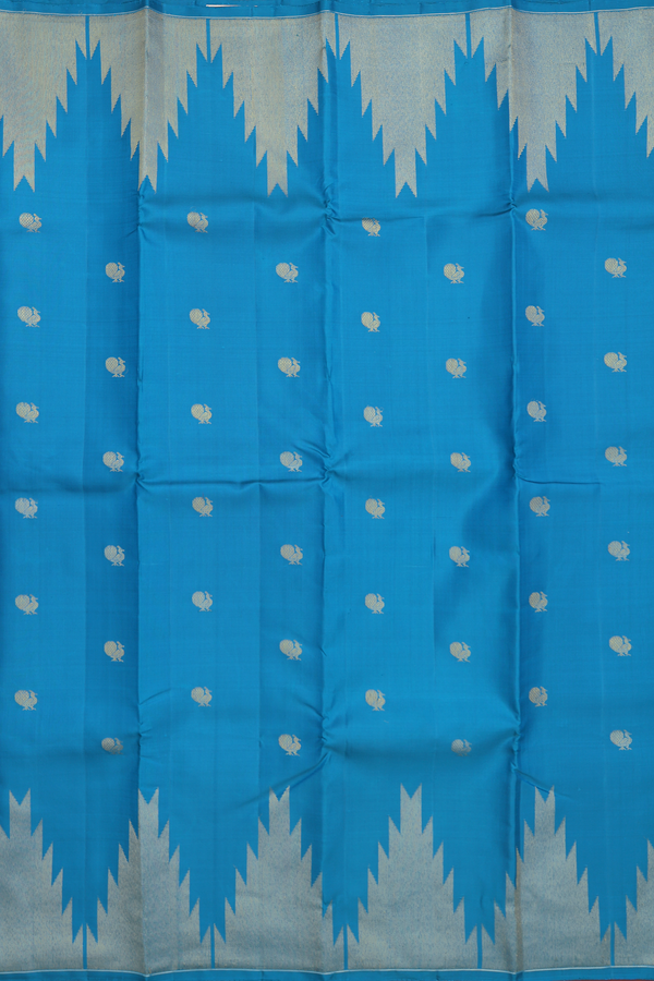 Kanchipuram Silk Saree In Blue With Peacock Buttas