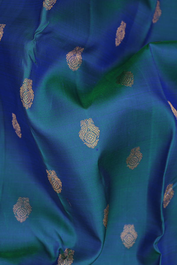 Kanchipuram Silk Saree In Teal Blue With Peacock Buttas