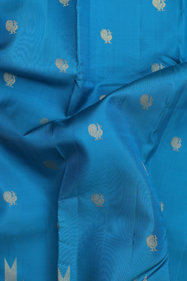 Kanchipuram Silk Saree In Blue With Peacock Buttas