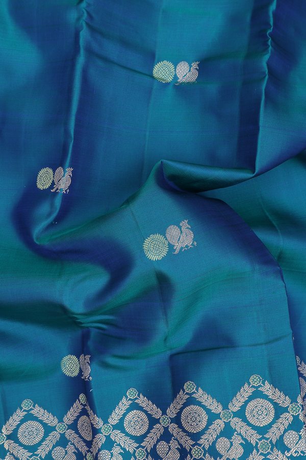 Kanchipuram Silk Saree In Teal Blue With Peacock Buttas