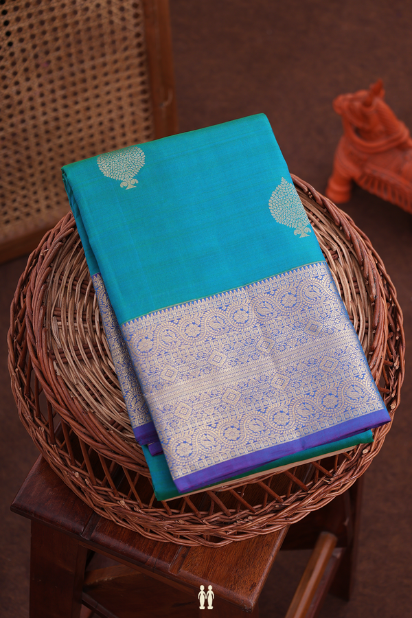 Kanchipuram Silk Saree In Teal Blue With Zari Buttas