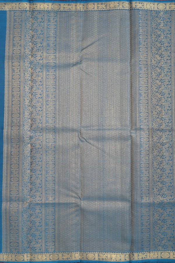 Kanchipuram Silk Saree In Teal Blue With Zari Buttas