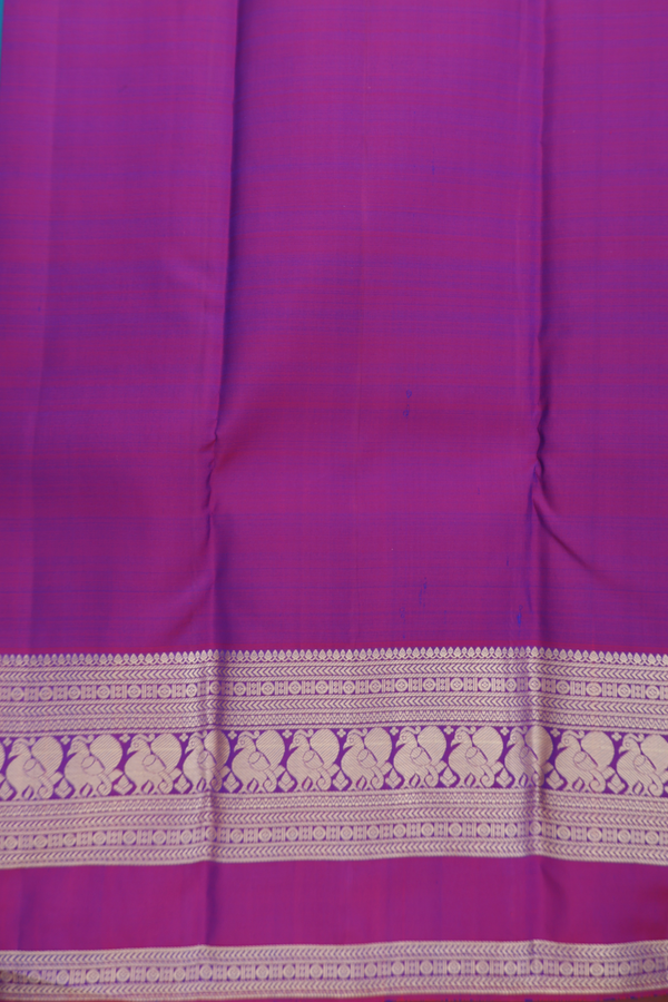 Kanchipuram Silk Saree In Teal Blue With Zari Buttas