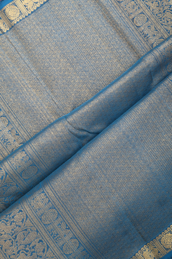Kanchipuram Silk Saree In Teal Blue With Zari Buttas