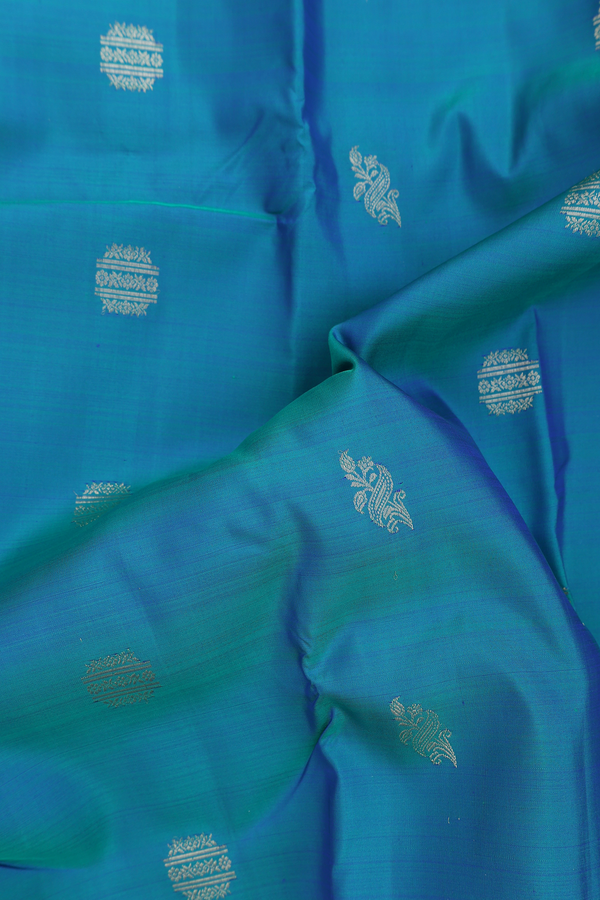 Kanchipuram Silk Saree In Teal Blue With Zari Buttas