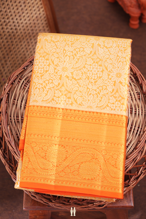 Kanchipuram Silk Saree In Tissue Orange With Floral Design