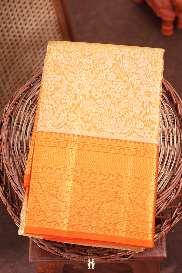 Kanchipuram Silk Saree In Tissue Orange With Floral Design