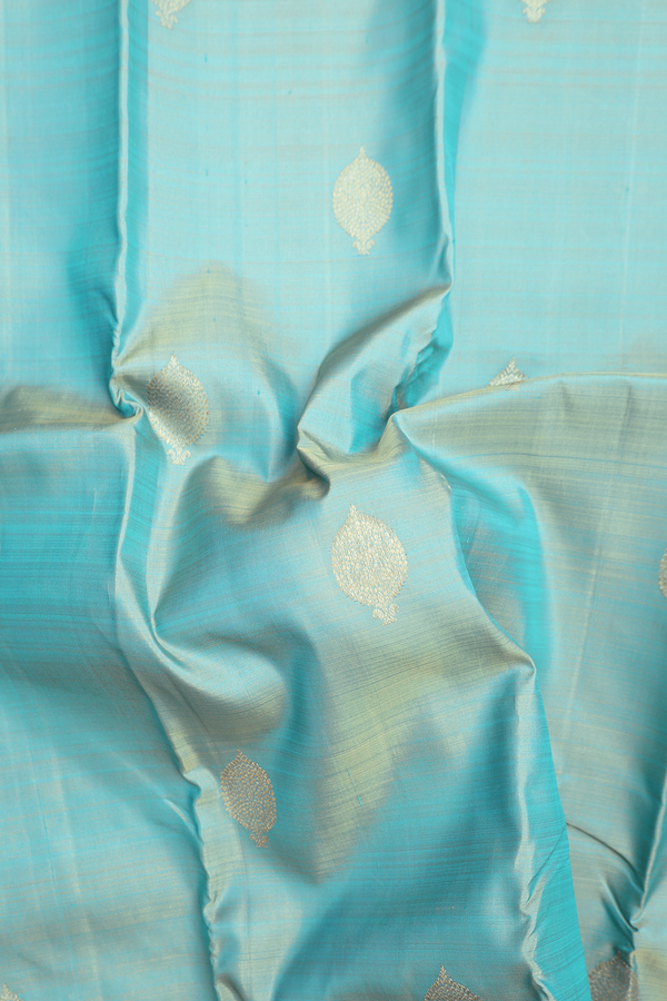 Kanchipuram Silk Saree In Turkish Blue With Zari Buttas