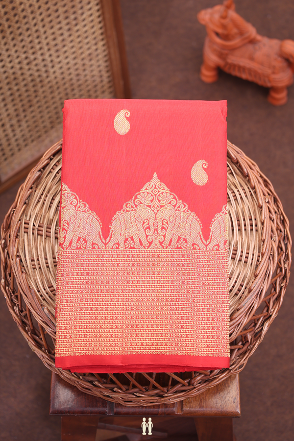 Kanchipuram Silk Saree In Vermillion Red With Paisley Buttas