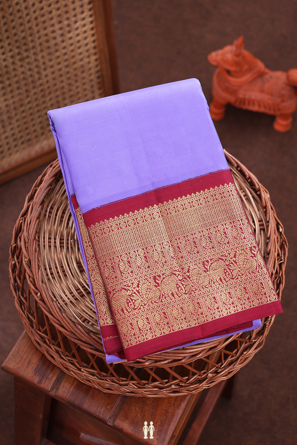 Kanchipuram Silk Saree In Violet With Traditional Border
