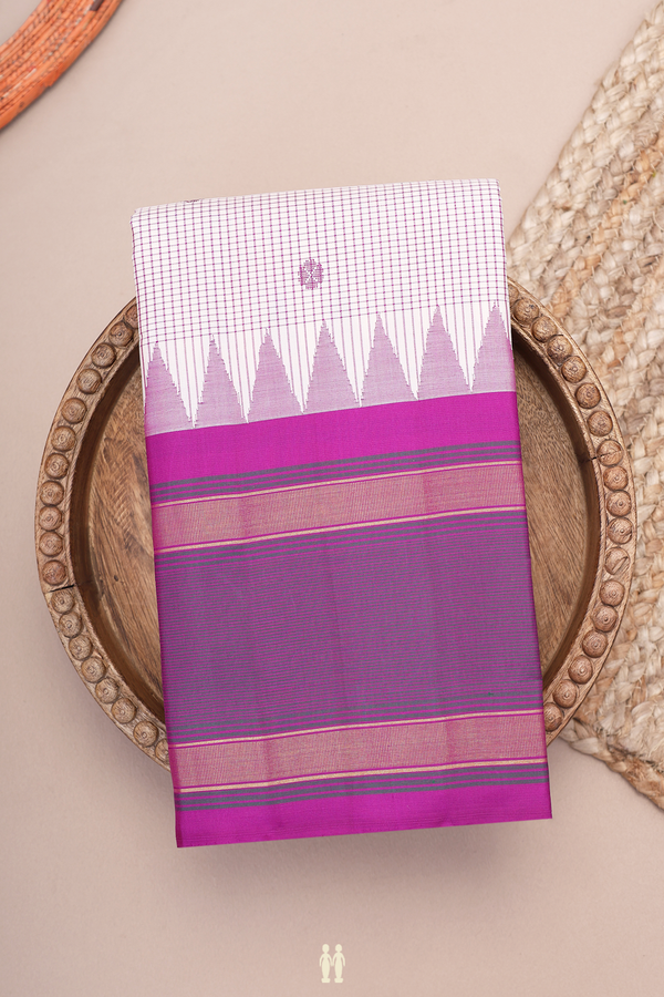 Kanchipuram Silk Saree In White Along Checks With Buttas