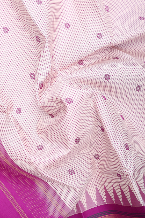 Kanchipuram Silk Saree In White Along Checks With Buttas