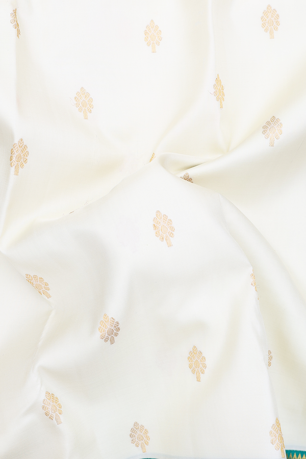 Kanchipuram Silk Saree In White With Floral Buttas