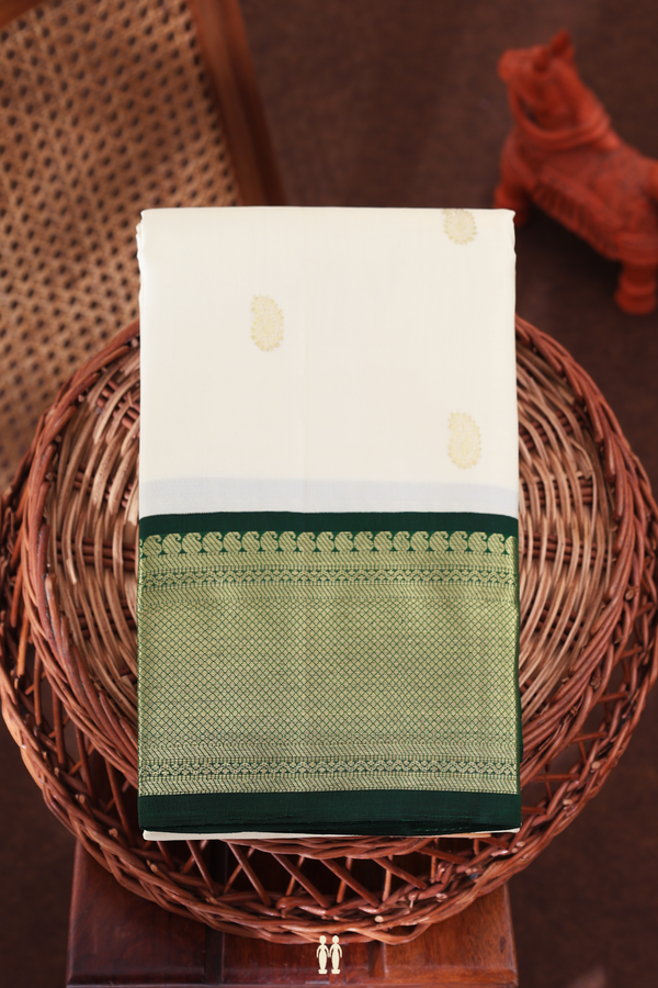 Kanchipuram Silk Saree In White With Paisley Buttas