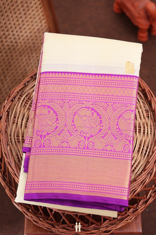 Kanchipuram Silk Saree In White With Peacock Buttas